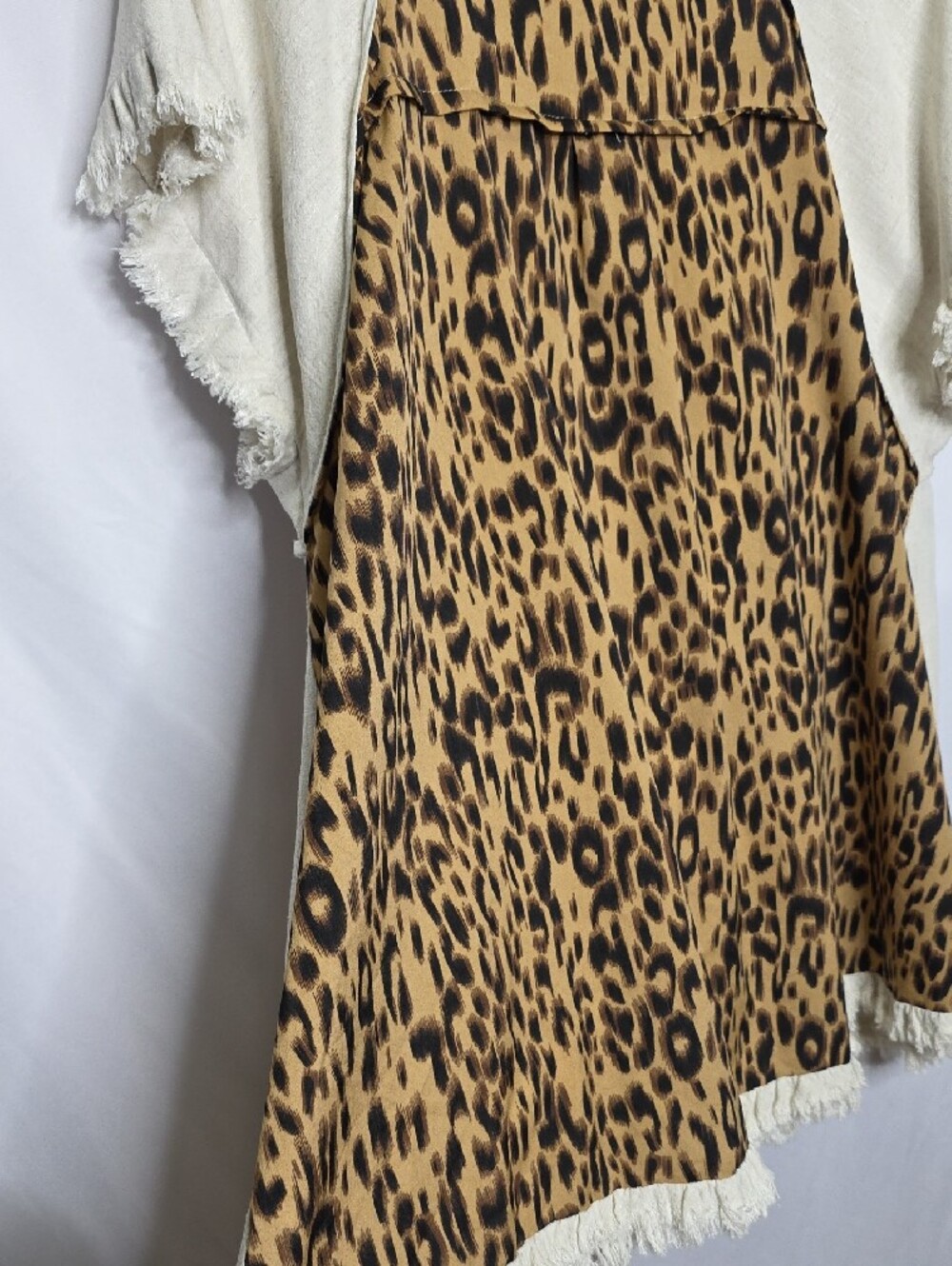 Umgee Cream Short-Sleeve Top with Leopard Accent On Back Side